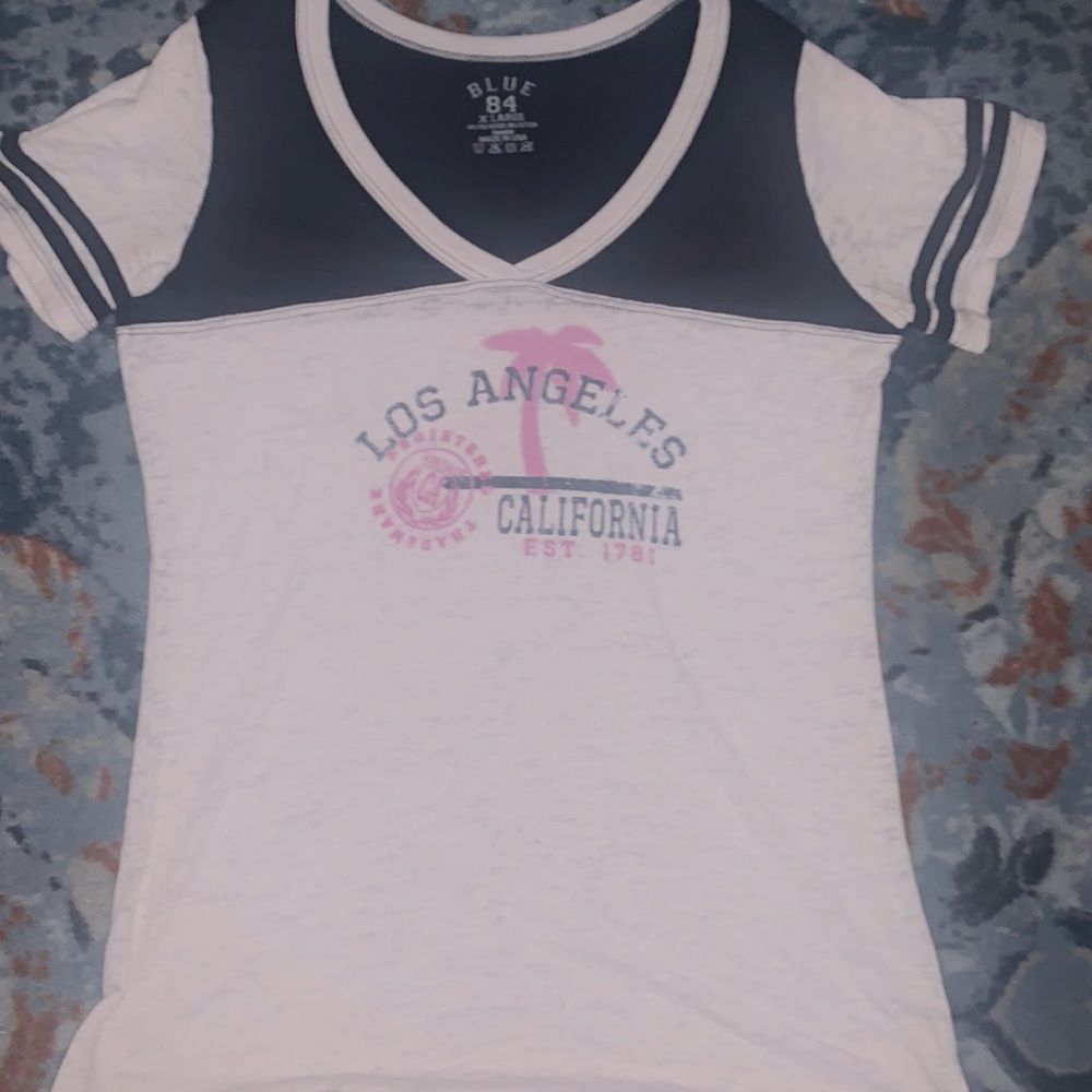 Juniors or ladies size extra large, short sleeve, V-neck shirt